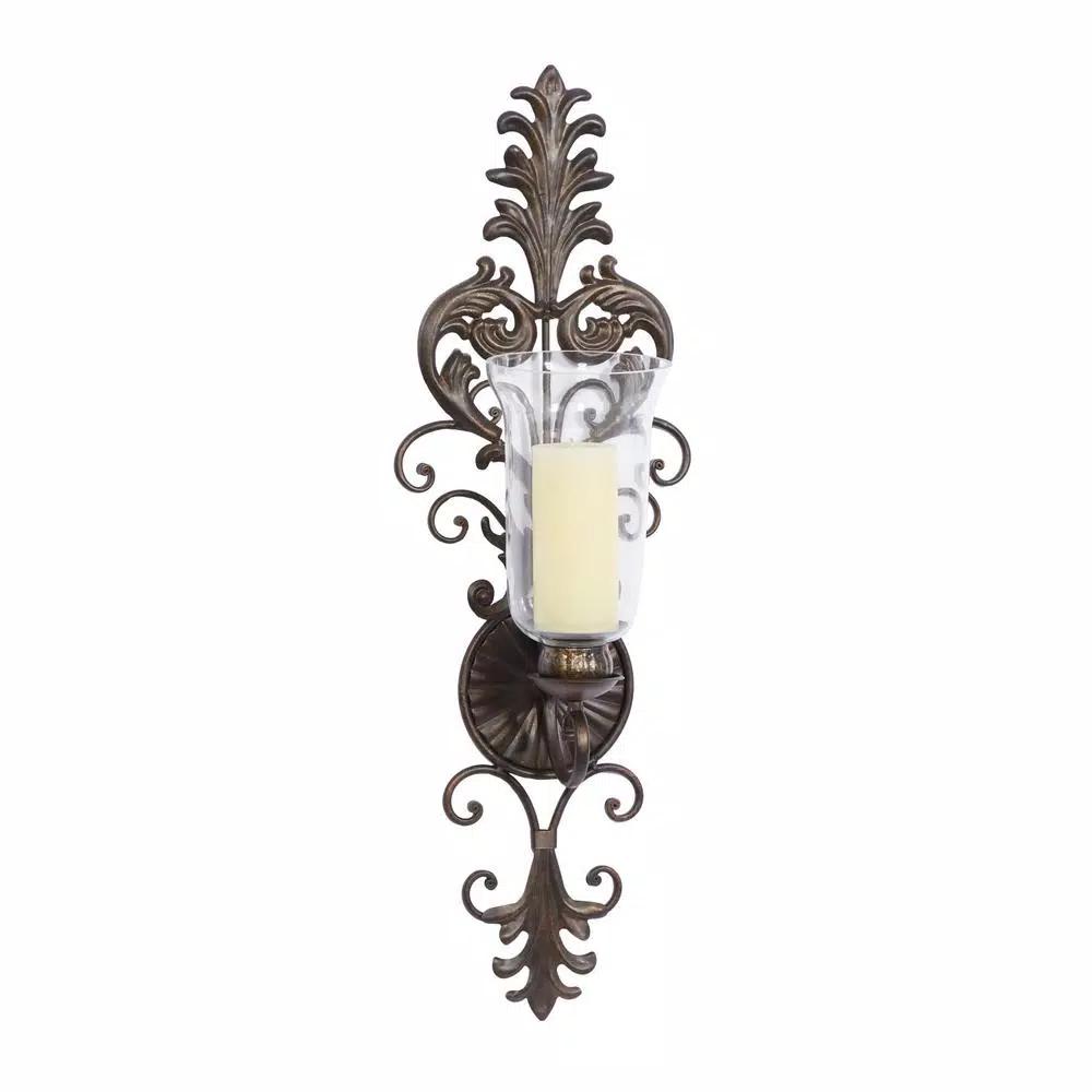LITTON LANE Antique Gold Flourished Iron Candle Sconce with Clear Glass Hurricane Shade