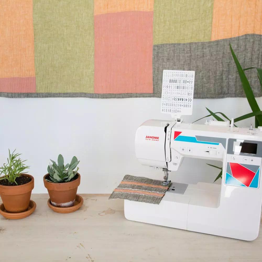 Janome MOD-100Q Computerized Quilting and Sewing Machine with Bonus Accessories