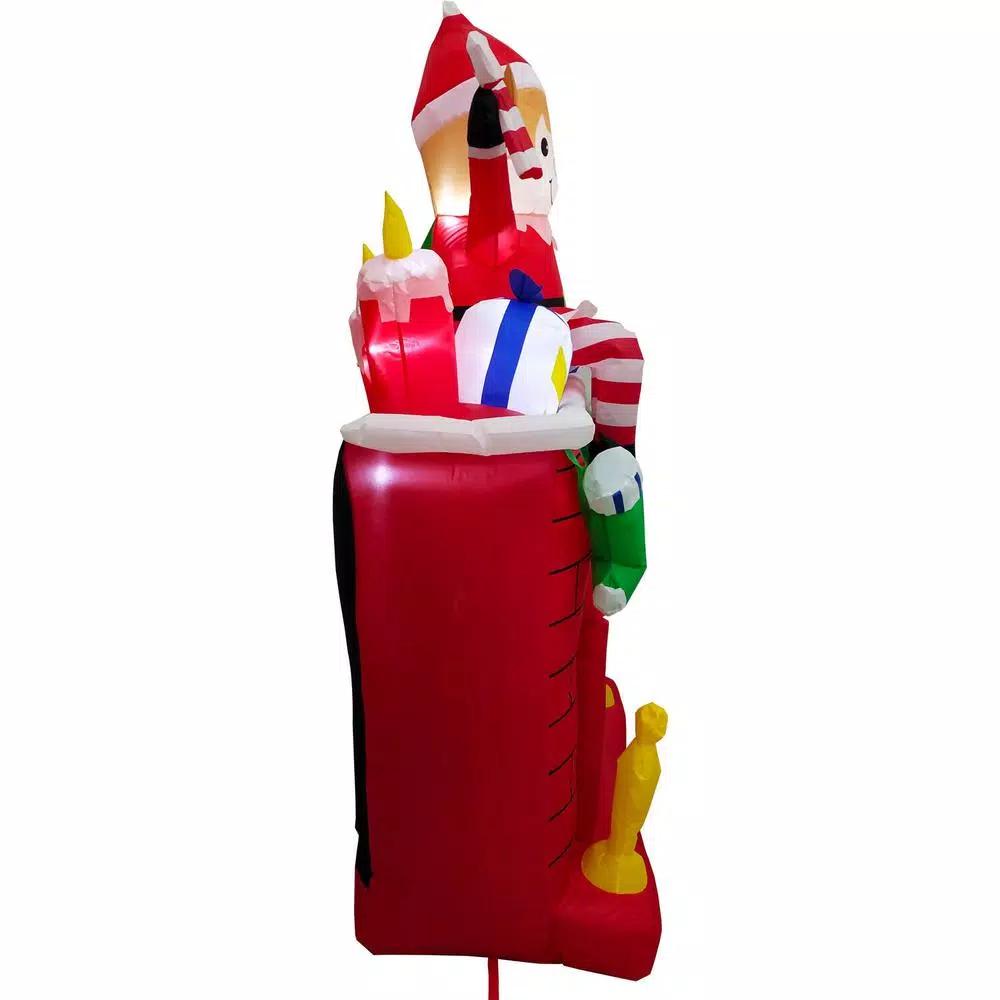 Fraser Hill Farm 6.5 ft. Pre-Lit Elf Sitting on Fireplace Christmas Inflatable