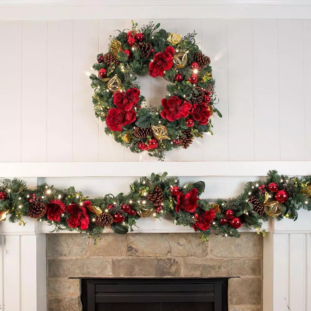 Village Lighting Company 9 ft. Pre-Lit Red Magnolia Christmas Garland with 100 LED Mini Lights