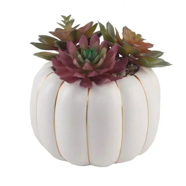 Flora Bunda 8 in. Fall Harvest Artificial Succulent Arrangement in Cream Pumpkin Pot with Gold Accents