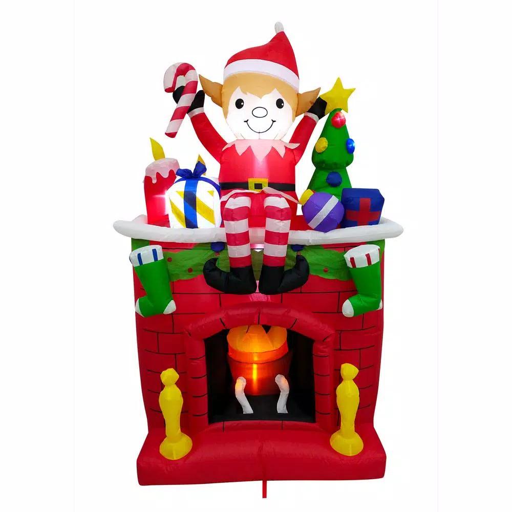 Fraser Hill Farm 6.5 ft. Pre-Lit Elf Sitting on Fireplace Christmas Inflatable