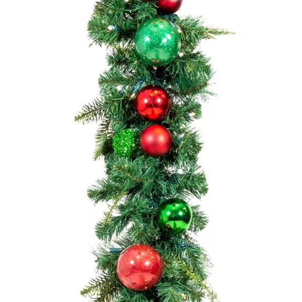 Village Lighting Company 9 ft. Pre-Lit LED Christmas Cheer Garland with Red and Green Ornaments