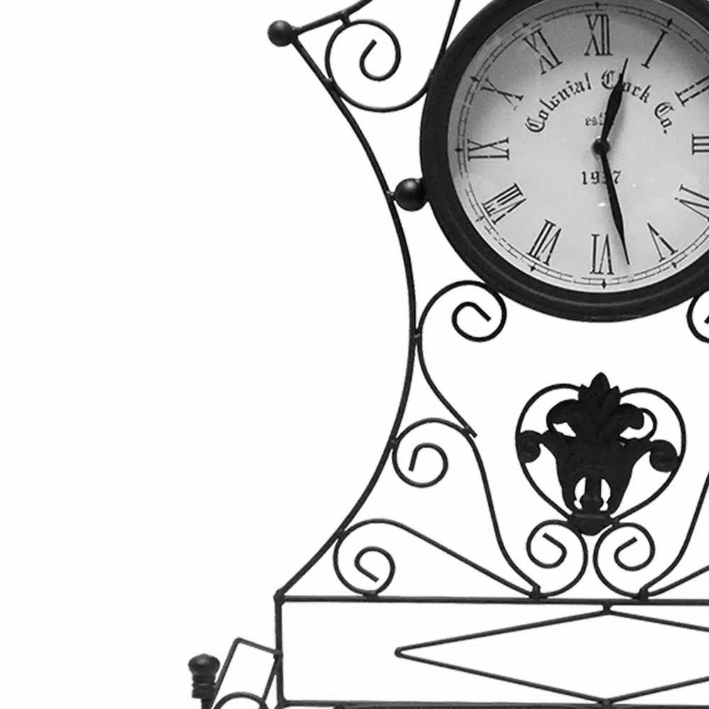 Benjara Epoch Black Metal Outdoor Clock with Scrollwork and Storage Base