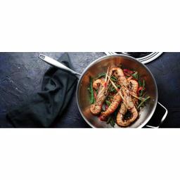 Tramontina 12 in. Tri-Ply Clad Stainless Steel Wok with Lid thumbnail 3