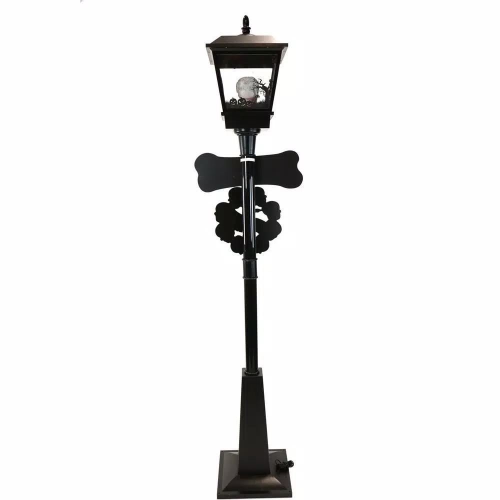 Haunted Hill Farm 71 in. Black Animated Skull Lamp Post with Spooky Music