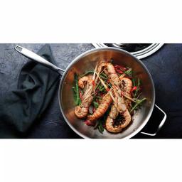 Tramontina 12 in. Tri-Ply Clad Stainless Steel Wok with Lid thumbnail 9