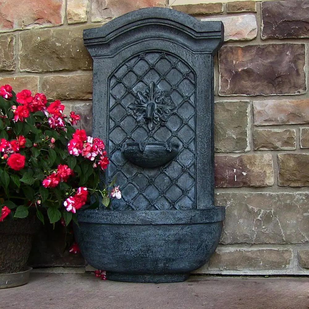 Sunnydaze Decor Rosette Resin Solar Outdoor Wall Fountain with Battery Backup and Lead Finish
