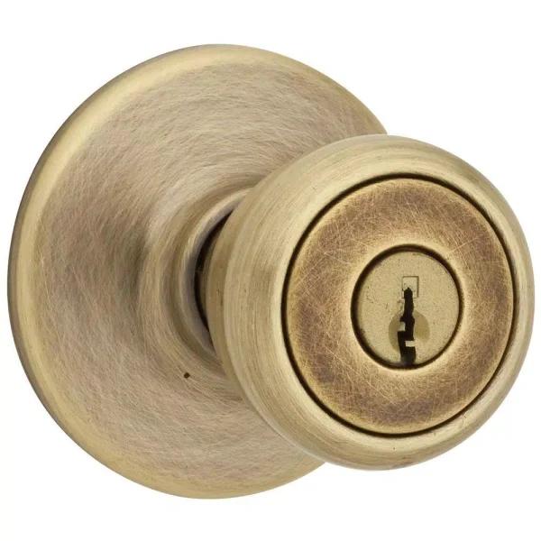 Kwikset Tylo Antique Brass Exterior Entry Door Knob with Microban Antimicrobial Technology