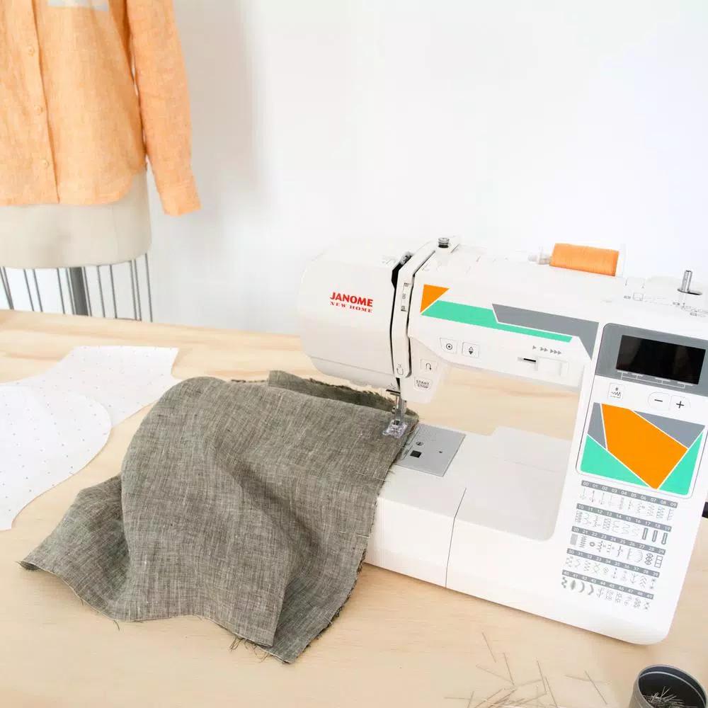 Janome MOD-50 Computerized Sewing Machine with 50 Stitches and 3 One-Step Buttonholes