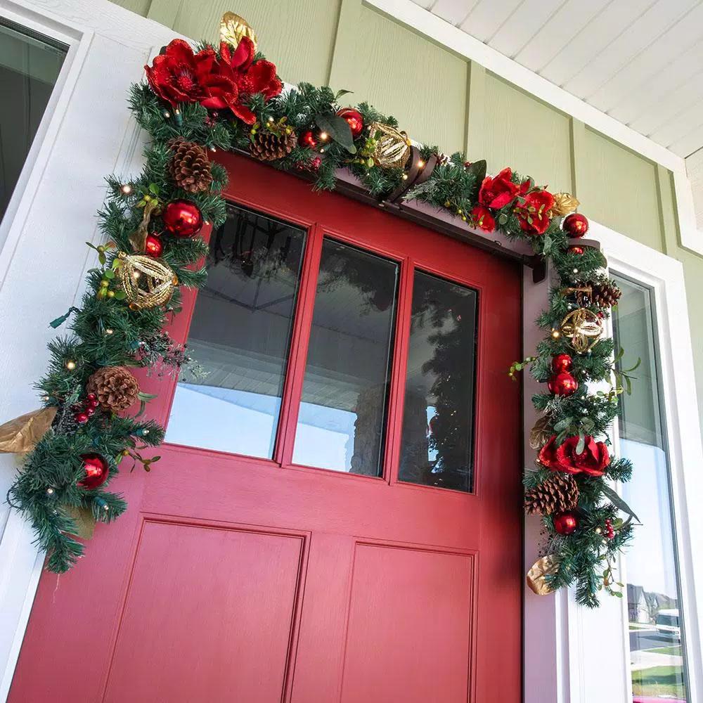 Village Lighting Company 9 ft. Pre-Lit Red Magnolia Christmas Garland with 100 LED Mini Lights