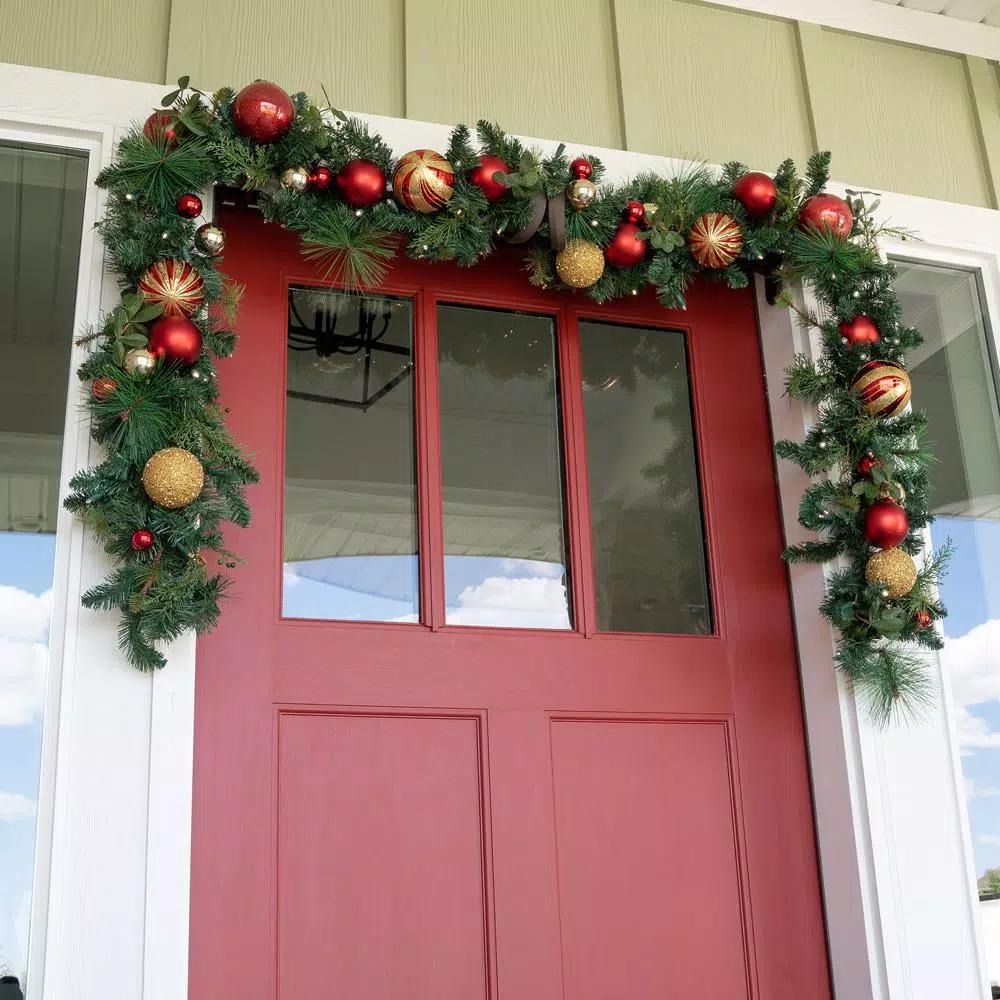 Village Lighting Company 9 ft. Pre-Lit LED Christmas Classic Garland with Red and Gold Ornaments