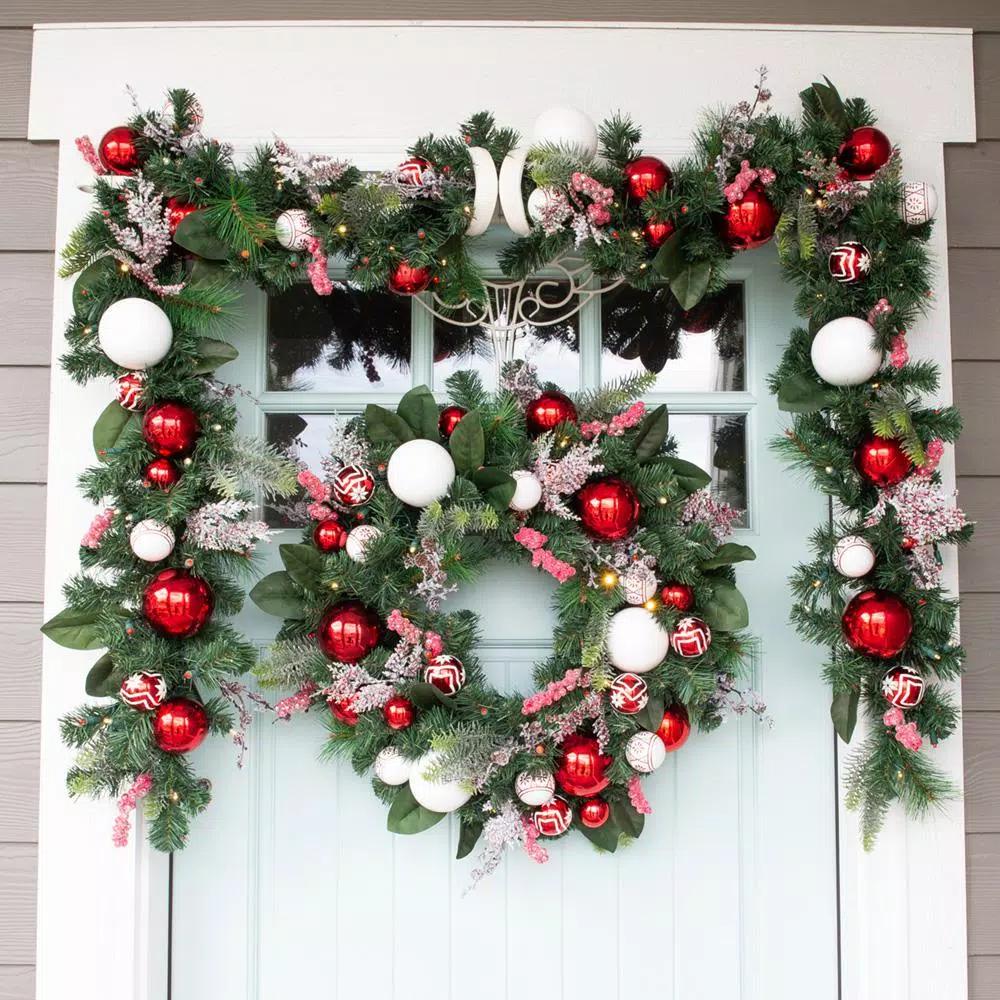 Village Lighting Company 9 ft. Pre-Lit LED Nordic Red and White Christmas Garland with 100 Mini Lights