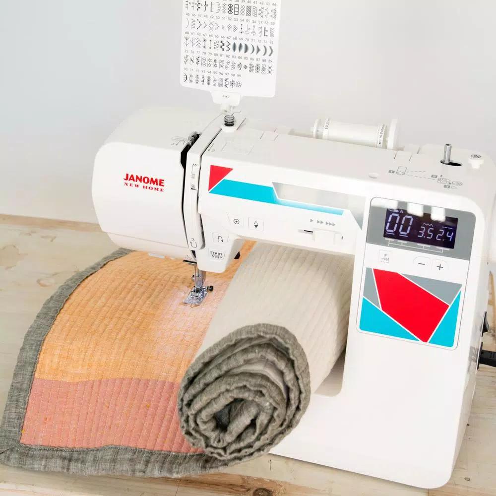 Janome MOD-100Q Computerized Quilting and Sewing Machine with Bonus Accessories
