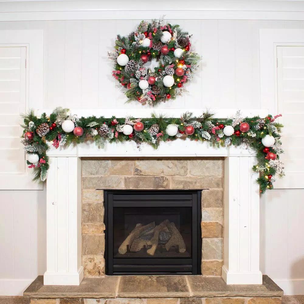 Village Lighting Company 9 ft. Frosted Wonderland Pre-Lit LED Christmas Garland, Red and White Candycane Theme