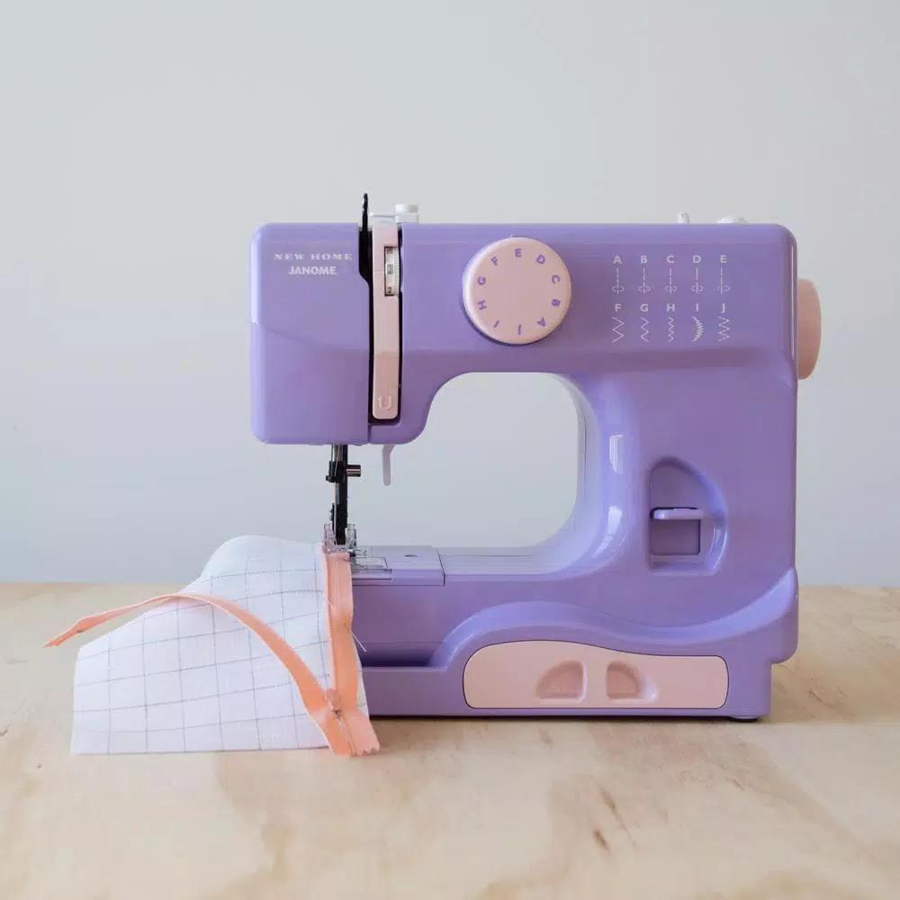 Janome Lady Compact Sewing Machine - 10 Stitch Options, 5 lbs Portable Design