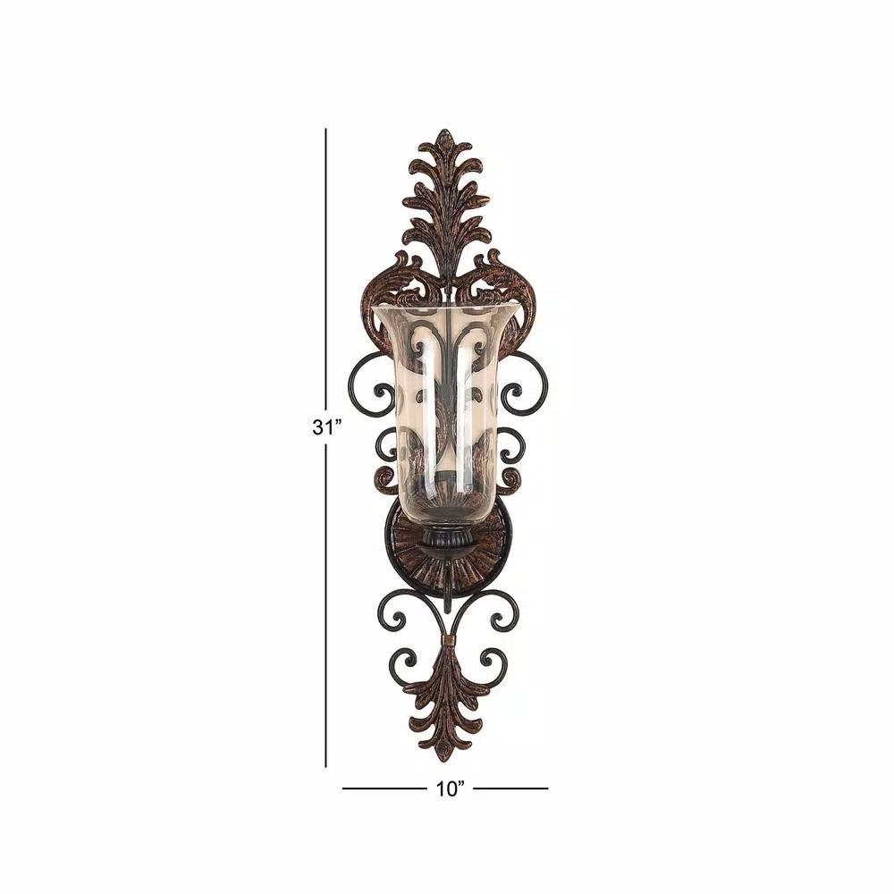 LITTON LANE Antique Gold Flourished Iron Candle Sconce with Clear Glass Hurricane Shade