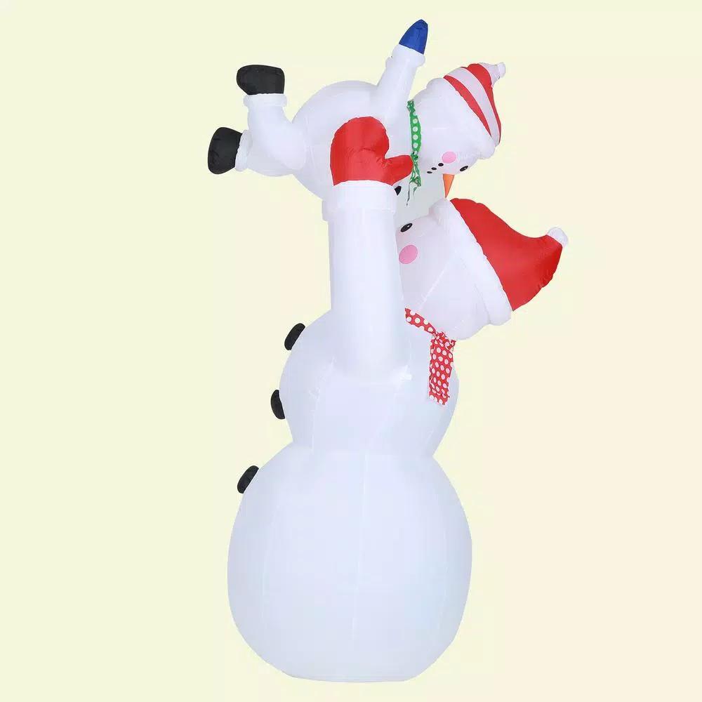 Luxen Home 8 ft. Snowman Family Playing Inflatable Holiday Yard Decor with LED Lights