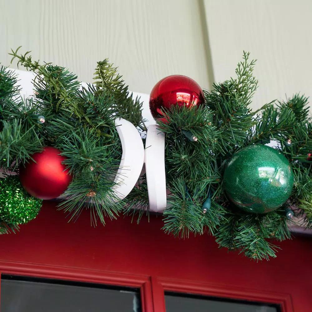 Village Lighting Company 9 ft. Pre-Lit LED Christmas Cheer Garland with Red and Green Ornaments