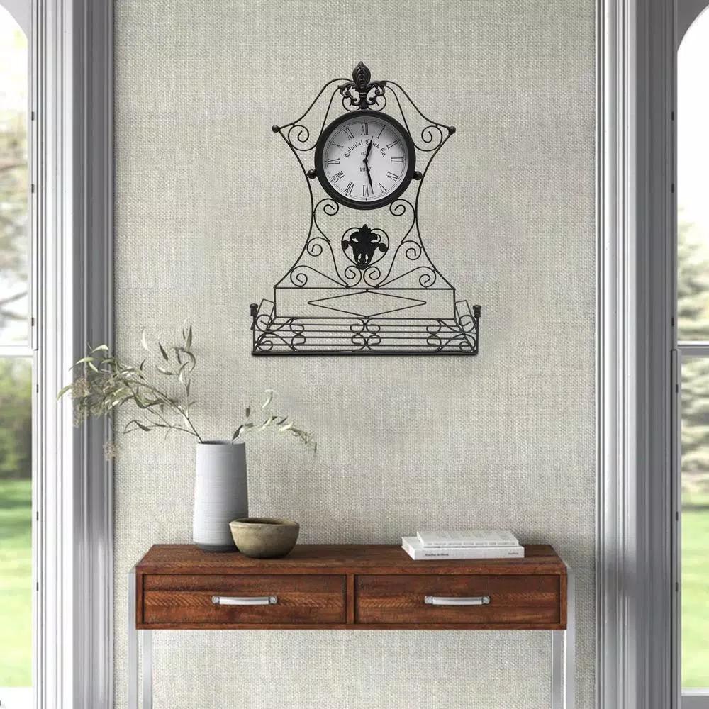 Benjara Epoch Black Metal Outdoor Clock with Scrollwork and Storage Base