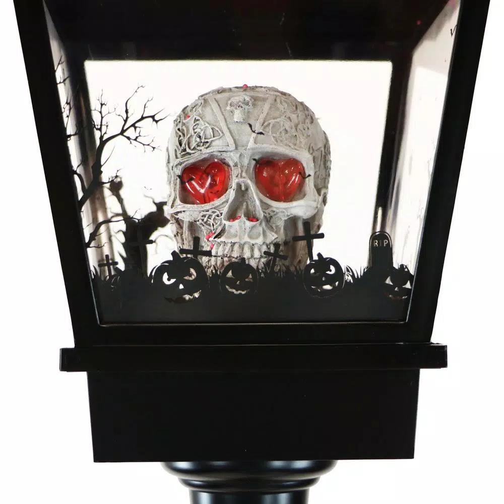 Haunted Hill Farm 71 in. Black Animated Skull Lamp Post with Spooky Music