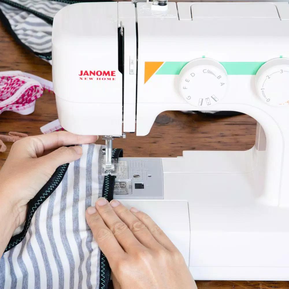 Janome MOD-15 Sewing Machine with 15 Built-in Stitches and Top Drop-In Bobbin System
