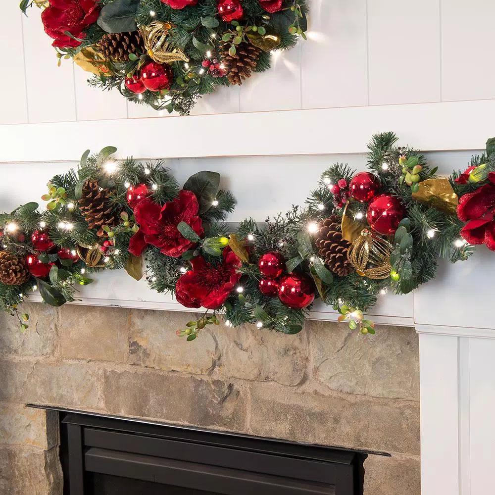 Village Lighting Company 9 ft. Pre-Lit Red Magnolia Christmas Garland with 100 LED Mini Lights