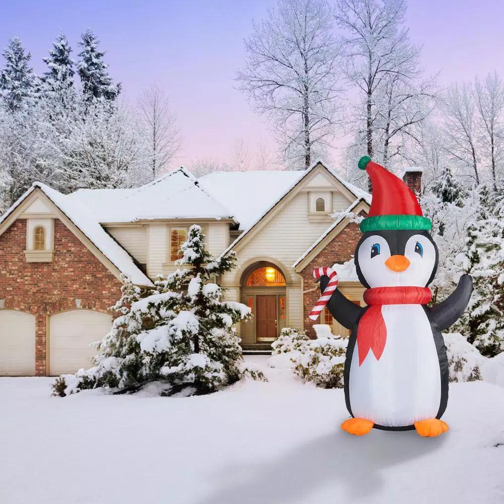 Fraser Hill Farm 10 ft. Penguin and Candy Cane Christmas Inflatable with RGB Lights