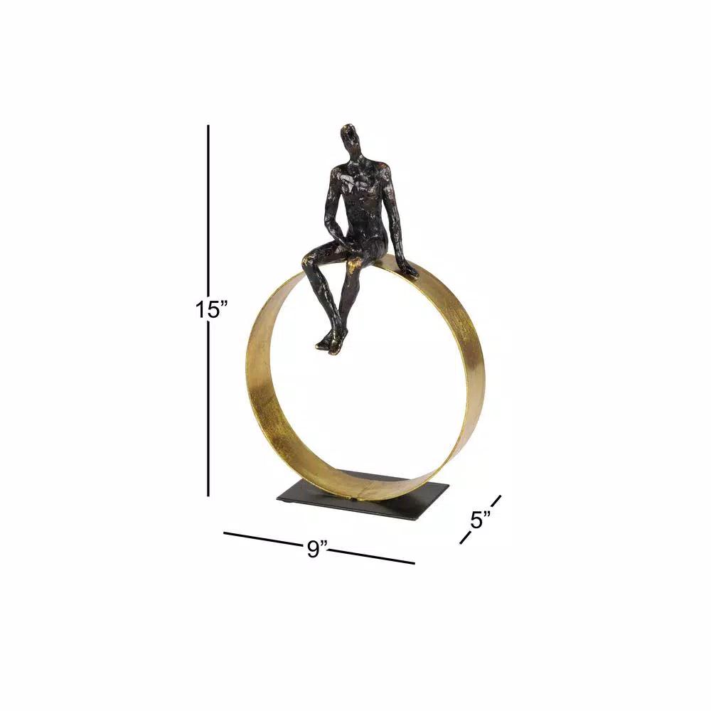 LITTON LANE Modern Textured Black Resin Man Figurine with Metallic Gold Circle Statue