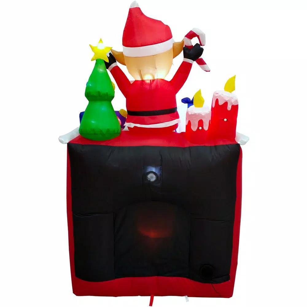 Fraser Hill Farm 6.5 ft. Pre-Lit Elf Sitting on Fireplace Christmas Inflatable