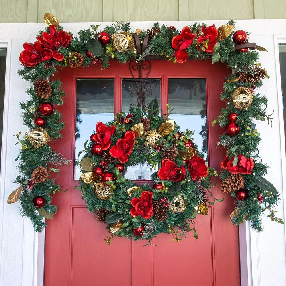 Village Lighting Company 9 ft. Pre-Lit Red Magnolia Christmas Garland with 100 LED Mini Lights