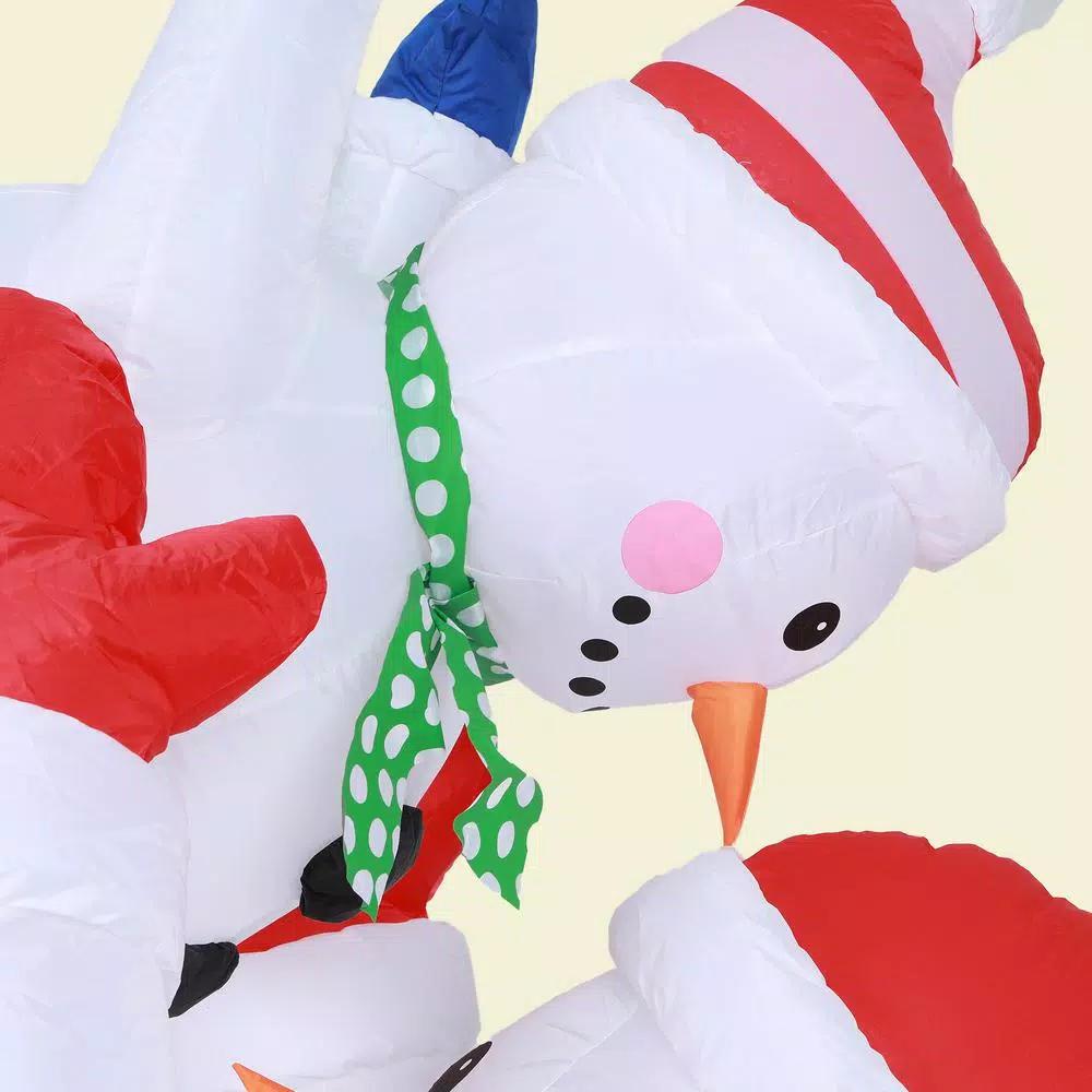Luxen Home 8 ft. Snowman Family Playing Inflatable Holiday Yard Decor with LED Lights