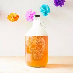 Cathy's Concepts 64 oz. Sugar Skull Glass Craft Beer Growler with Screw-Top Lid and Handle thumbnail 3